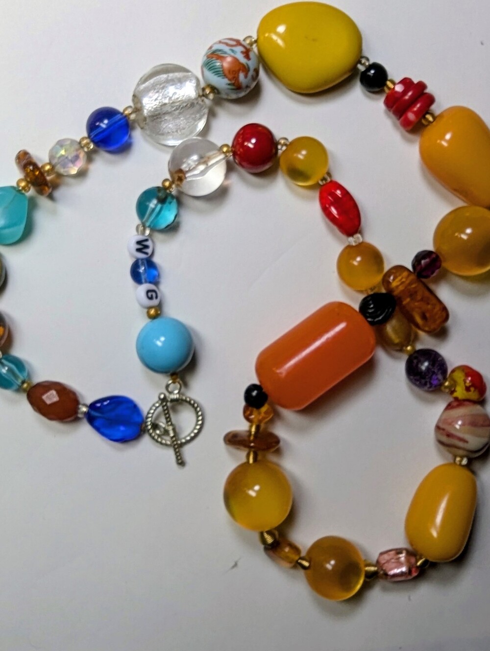 Wendy Gell beaded necklace Amber turquoise stones.